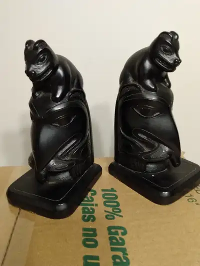 Solid and heavy Bomo resin Alaskan figurines..alaskan sled is 8 in.long. figurines are 7 in. tall. t...