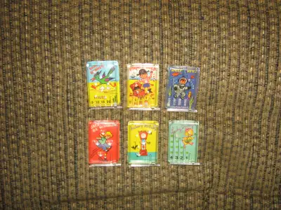HEY FOR SALE IS A LOT OF PINBALL GAME PRIZES FROM CRACKER JACK BOXES. THEY ARE ALL IN EXCELLENT COND...