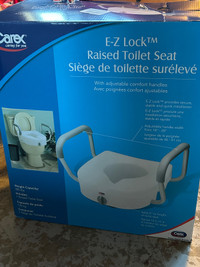 New Raised Toilet seat never used .