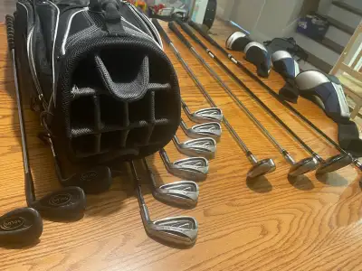 I'm selling a set of used Nike Slingshot golf clubs with golf bag. This complete set includes everyt...