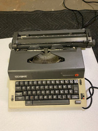 vintage typewriter Olympia report electric Armando Argentini