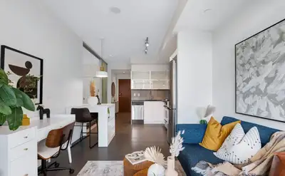 This bright and modern 1-bedroom condo features a functional open-concept layout, floor-to-ceiling w...