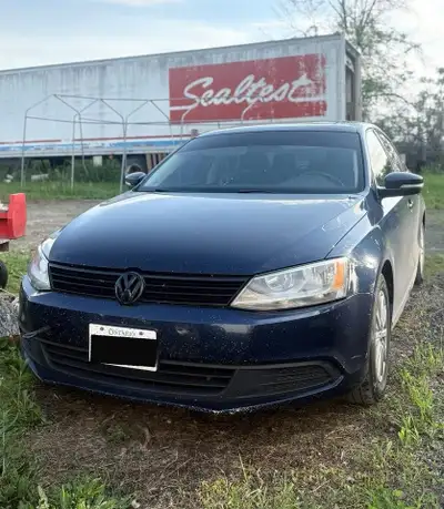 Selling a 2013 Volkswagen Jetta. The vehicle runs, stops, and drives - sold as is. It has 293,800KM....