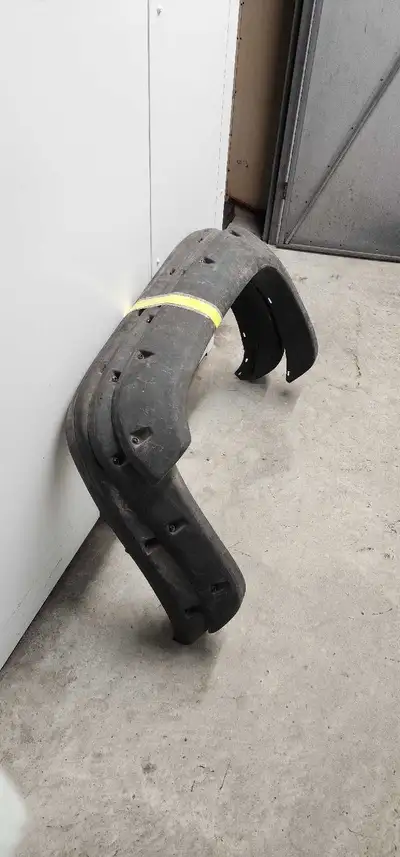 Wheel flares. Brand new, never used. Painted in a rubber coating. They are dusty from sitting in sto...