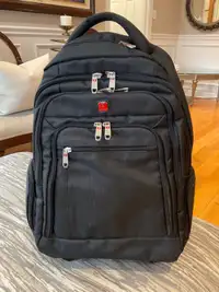 Tracker backpack on wheels. New