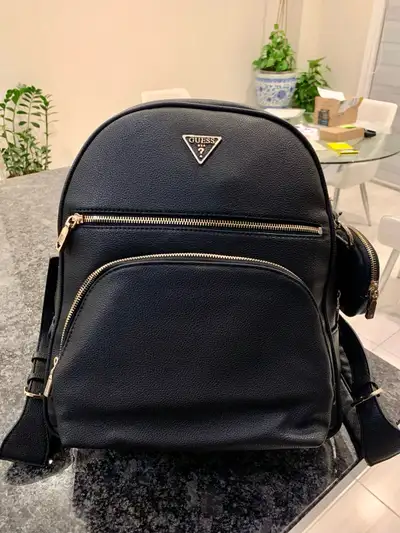 New GUESS Black “Power Play Large Tech” Backpack Brand New, with tags. Unused. Comes with white carr...