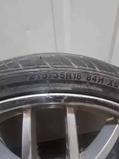 Selling a set of used 18-inch rims with a 4x100 bolt pattern, sized at 215/35R18. Please note these...