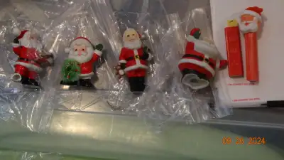 Santa figures, 7, ceramic, plastic, PEZ , most small , good cond, View more