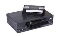 VCR PLAYER PLUS OVER 100 TAPES