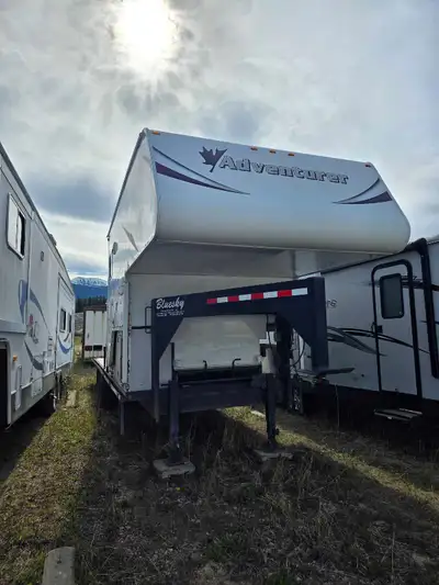 Custom built 27' gooseneck trailer Have both gooseneck and fifth wheel pieces. 14000lbs axles. 2x700...