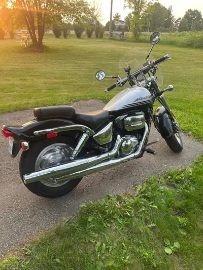 Paint has some small chips and scratches. Chrome has minor rust. Windshield is missing a few bolts....