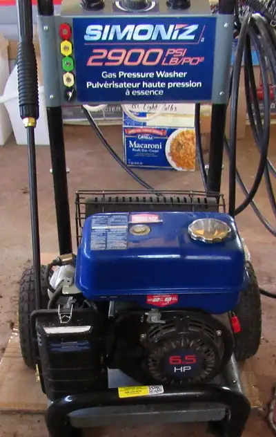 Simoniz 2900 gas pressure washer plus a second Simoniz 2900 with hose and wand and tips for parts (m...