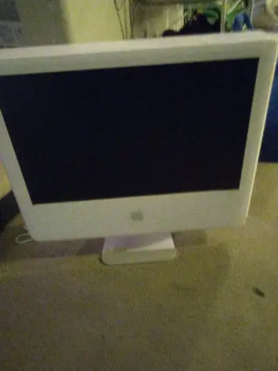 Apple iMac G5 with a 2.0 GHz PowerPC G5 processor and a 20-inch display is known for its sleek, all-...