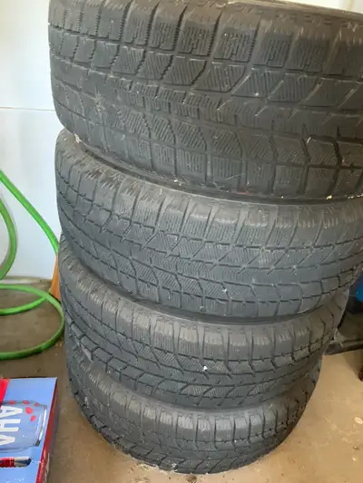 A set of 4 winter tires and alloy rims with universal bolt hole pattern. Came off a ford mustang. Lo...