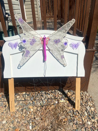 Butterfly headboard.