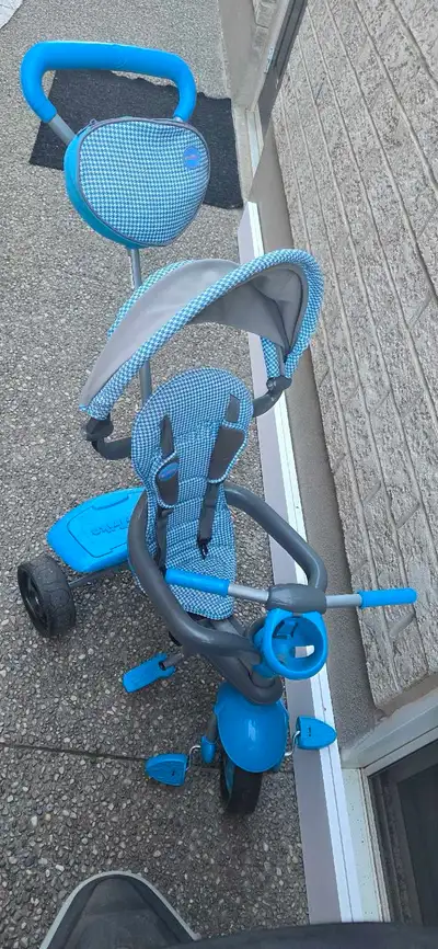 Tricycle and a Jogging Stroller, View more