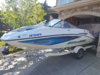 2006 Seadoo Challenger 180 with a 215 hp supercharger Rotax 4-Tec Engine. I have owned this boat sin...
