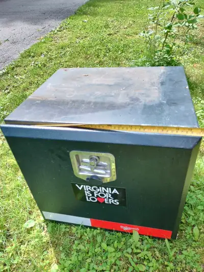 Solid metal box that was on back of van. Has lock and key and rubber gasket to keep water out. The o...