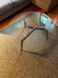 Beautiful 31" glass coffee table with oak legs