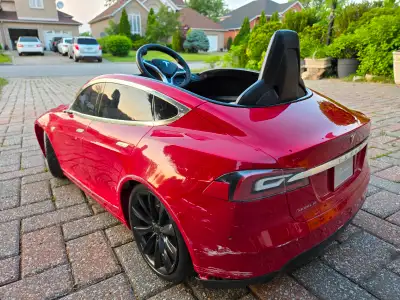 For sale is a nice Tesla ride on sport car. Comes with battery and charger. It is in perfect working...