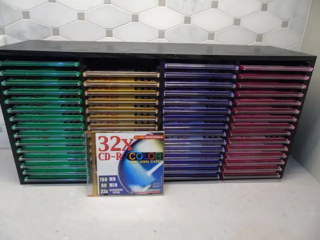 CD Rack - Spring Eject with 60 CDs in Colored Slim Jewel Cases