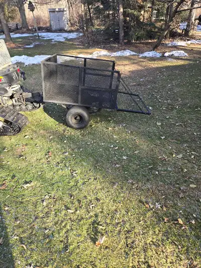 Home made atv traiker can be made road worthy holds almost a cord of wood new tires fresh durable pa...