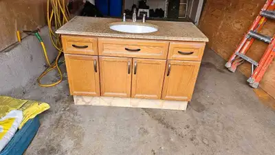 This granite counter with a solid wood vanity is ready to bring a touch of elegance to your bathroom...