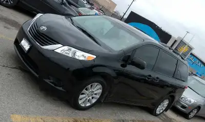 2014 Black Toyota Sienna AWD minivan with 390,000 KMS (mostly highway driven). Currently being drive...