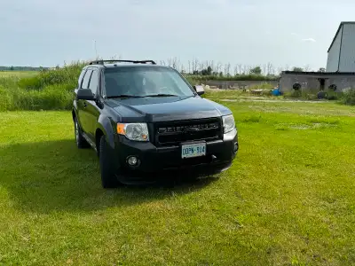 2009 Ford escape in great shape safety four months ago . New struts, all new brakes, new front, lowe...