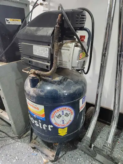 15 gallon air compressor. Works but has a small leak.