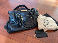 Black leather and gold diaper bag