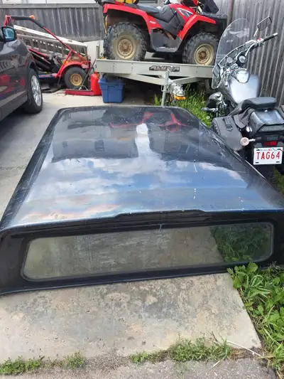 Canopy off 2007 chev approximately 6.8 box has one broken window 250 obo