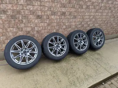 Michelin X-Ice Winter tires, 225/50R17, on 17" Fast Alloy Wheels, bolt pattern of 5x114.3mm. They ca...