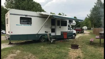 Camping in Comfort! 4 burner stove, oven, 2 pc bath, separate shower, A/C, furnace, new front/rear c...