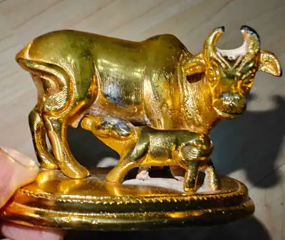 Small metal kamdhenu Pooja figurine , View more