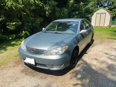 2005 Toyota Camry, new tires, serviced regularly, as is.
