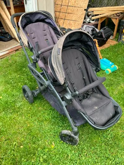 Selling both strollers. Kids have grown out of them. Double stroller is in okay condition. The fabri...