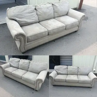 ** If this ad is up, the couch is available** This Beige suede sofa is good shape! Has a few moving...