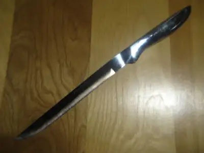 Couteau entièrement stainless steel JAPAN lame de 7 pouces. Taper le lien suivant pour voir mes autr...