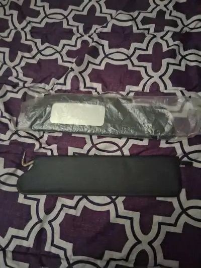 I am offering a pair of MGB visors, including one new visor still in its original packaging and one...