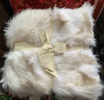 I have 2 Brand NEW Pier 1 (One) Imports “Arctic Fox” Faux Fur Luxurious 50”x60” Warm Throw Blanket....