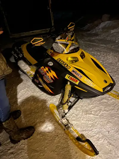 Skidoo 600 renegade works good electric start reverse new 136 track windshield is cracked Call or te...