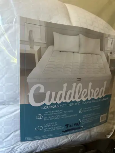 New Twin mattress pad. $35, View more