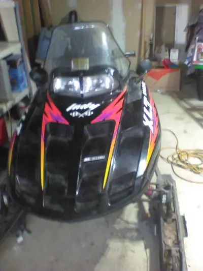 Polaris xlt indy special 600cc Pull start no reverse sled is in good condition but will need a littl...