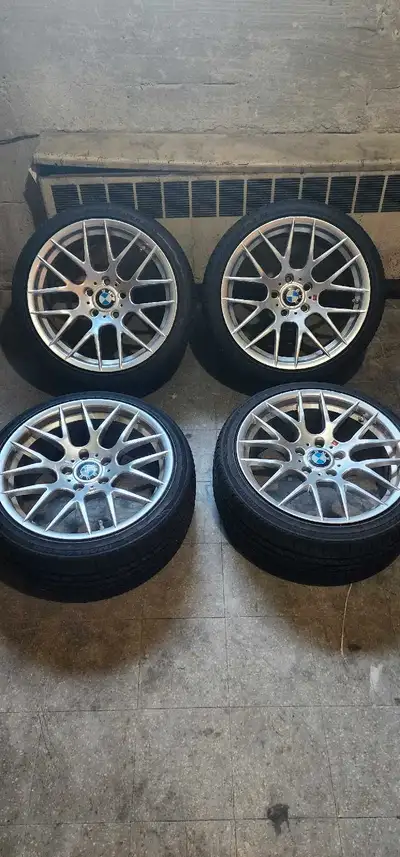 These Bmw 335i wheels & tires are ready to hit the road, boasting a staggered setup with 225/40ZR18...