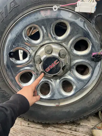 GMC rims Good shape Have all center caps Tires are junk 17” $300