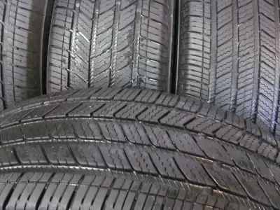 Tires only have 25,000 Km of use. 225/65R 17 102H have lots of tread and km left. These tires handle...