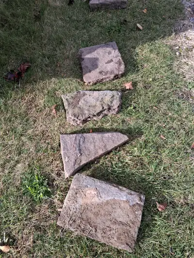 21 red and grey flagstone various sizes. 2 to 3 in in depth.