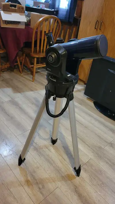 Meade Telescope Explore the cosmos with this Meade telescope, perfect for stargazing and celestial o...