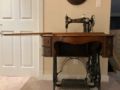 Antique sewing machine, View more